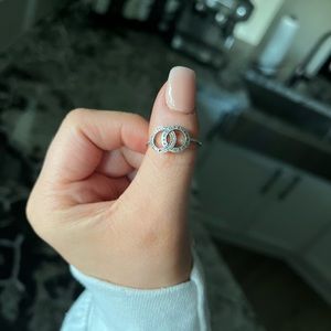 Sterling Silver Pandora ring - approx size 6-7 (one cubic zirconia is missing)